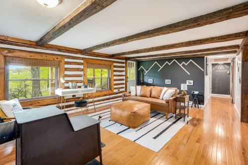 Modernized Log Cabin w Hot Tub Fire Pit & Views in Berkeley Springs