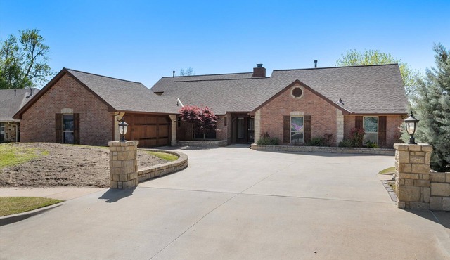 Spacious 5-bedroom/4.5 bath home in lovely Norman with heated swimming pool