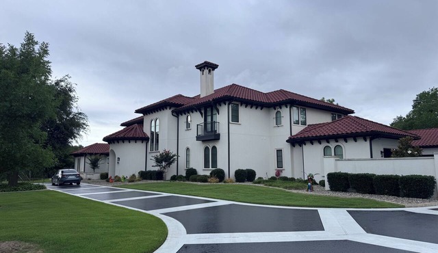 Spacious and modern 5 bedroom, 5 1/2 bath home with a pool and media room.