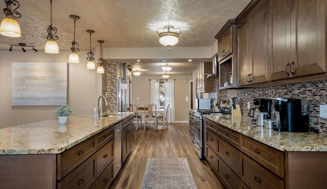 Spokane South Hill entertainer’s haven w/theater, wine room & BBQ patio.