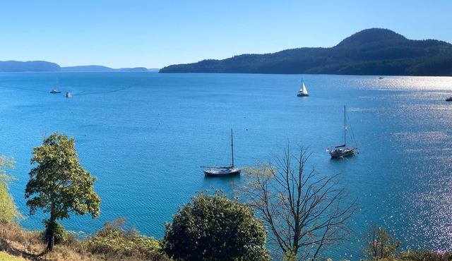 Stunning water view w/ three private balconies & gas fireplace in Rosario Resort