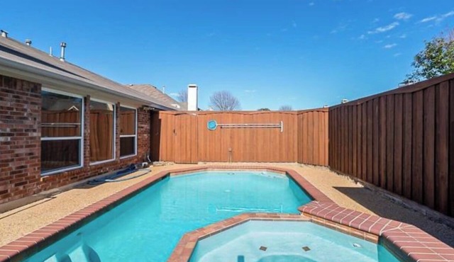 Updated 1 story home in Frisco with a pool and high end furniture!