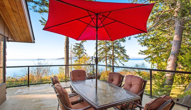 Updated sound front home with water & mtn views, fireplace, firepit, balcony
