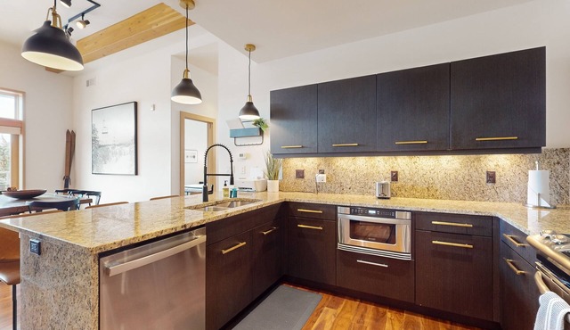 Walkable condo with mountain-view deck, firepit & bar/restaurant downstairs