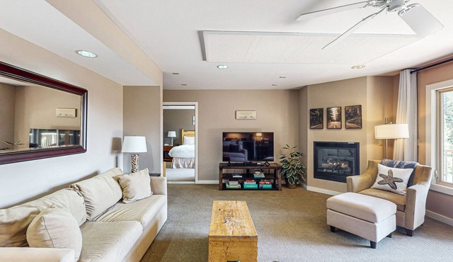 Wonderful escape with water access, three balconies, W/D, & gas fireplace