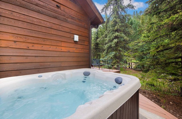 Fall River Riverfront Condo + Private Hot Tub