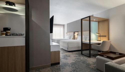 Queen Suite with Two Queen Beds and Sofa Bed