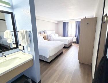 Standard Queen Room with Two Queen Beds and Bath/Shower