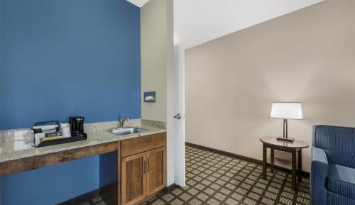 One-Bedroom King Suite with Roll-In Shower and Sofa Bed - Disability/Non-Smoking