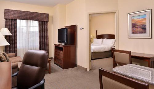 Two-Bedroom Suite with One King Bed, Two Queen Beds and One Sofa Bed - Mobility Accessible Tub
