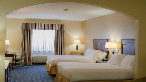 Queen Suite with Two Queen Beds and Sofa Bed