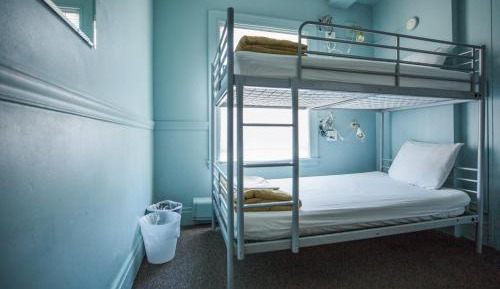 Single Bed in 6-Bed Female Dorm - Shared Bath