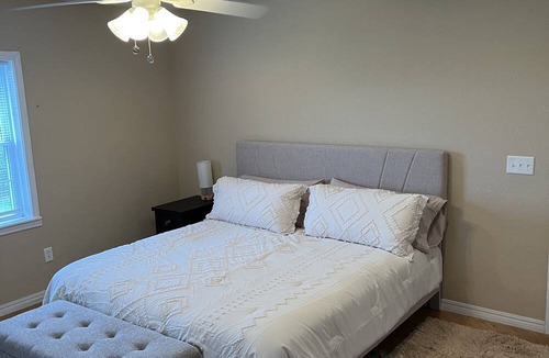 Board Camp House | Ride to the ATV trails from this Spacious 4-bedroom house with RV hookup!